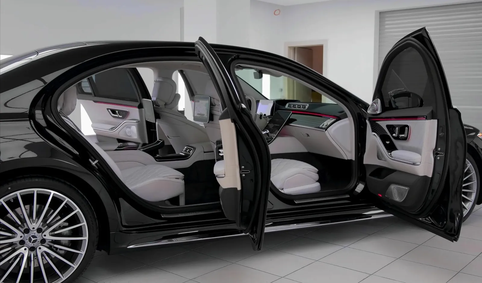 Black Mercedes S-Class with open doors and white leather interior — Cannes Driver private transfer vehicle